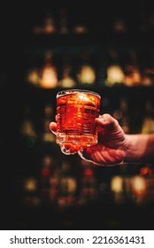 Male Hand Holding A Glass Of Coktail In A Bar