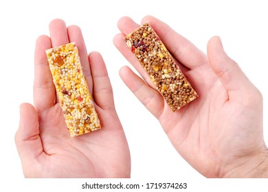 Male Hand Holding Healthy Granola Bar Isolated On White Background