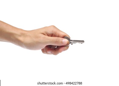Male hand holding a key isolated