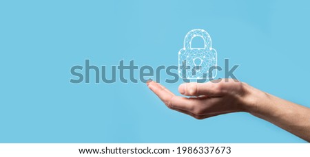 Male hand holding a lock padlock icon.Cyber security network. Internet technology networking.Protecting data personal information on tablet. Data protection privacy concept. GDPR. EU.Banner.
