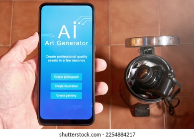 Male hand holding mobile phone with interface of mobile app capable of generating art using AI, with photography camera on trash can in the background. Concept of AI replacing jobs.