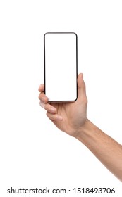 Male hand holding modern cell phone with blank screen for mockup, vertical shot with copy space - Shutterstock ID 1518493706