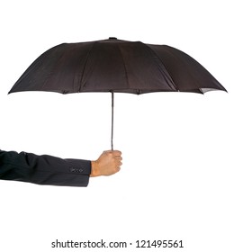 Male Hand Holding Opened Black Umbrella Isolated On White