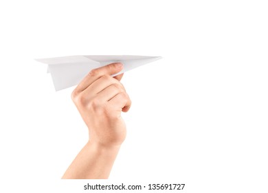 Male Hand Holding A Paper Airplane, Isolated On White Background