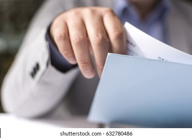 Male Hand Holding Restaurant Menu To Make Order For Lunch