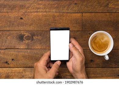 Male hand holding smartphone with blank screen. - Shutterstock ID 1902987676