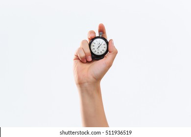The male hand holding a stopwatch against a white background