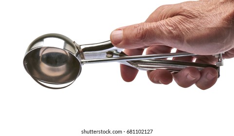 Male Hand Holding A Used Metal Ice Cream Scooper Isolated On White. Clipping Path