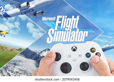 Male Hand Holding A Xbox Series S White Controller With Microsoft Flight Simulator Game Blurred In The Background. Rio De Janeiro, RJ, Brazil. November 2021.