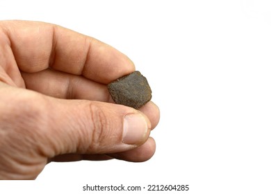 Male Hand Holds A Piece Of High Quality Hash. Medical Marijuana Extraction Hash Cannabis Pollen Hashish