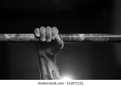 Male Hand In Horizontal Bar, Preparing To Pull Up Exercise. Black And White Image