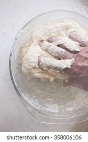 male hand knead the dough into dumplings, close up. photo toning Pastel - Shutterstock ID 358006106