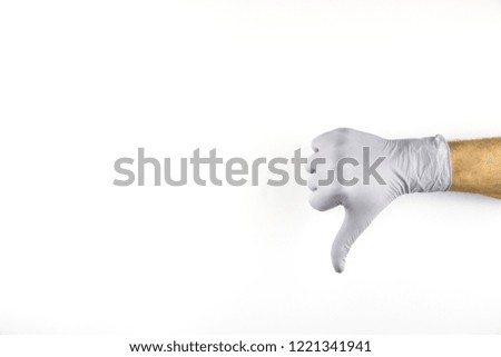 Male hand in medical glove on white background.