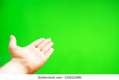 Male hand offers something. Chroma key. Place for your advertisement. - Powered by Shutterstock