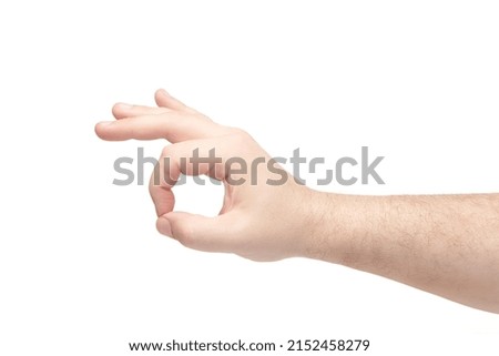 Male hand ok sign isolated on white background. Brutal man's palm showing ok gesture. Finger gestures.