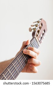 Male Hand On Guitar Fretboard G Major