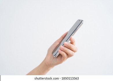 Male hand operating a mobile phone - Shutterstock ID 1850113363