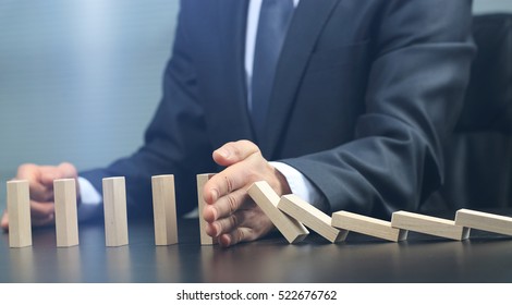 male hand placing wooden block on a tower. planing and strategy concept - Shutterstock ID 522676762