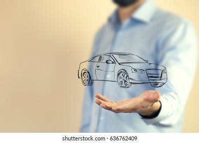 Male hand presenting car icon on virtual screen