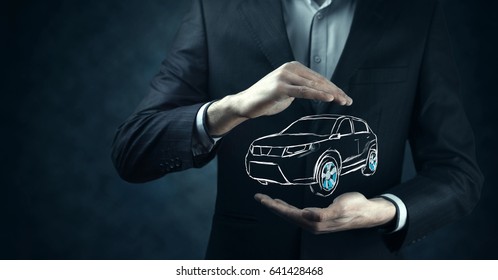 Male Hand Presenting Car Icon On Virtual Screen.