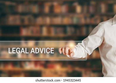 Male Hand Pressing The Word Legal Advice On A Virtual Search Display Bar. Online Legal Advice Concept.

