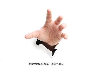 Male hand punching through the paper