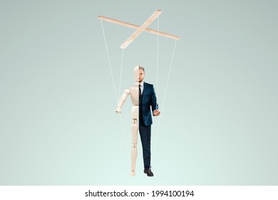 Male Hand, Puppeteer Controls The Puppet Puppet With Strings. The Concept Of Shadow Government, World Conspiracy, Manipulation, Control