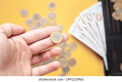 Male Hand Showing Coin. Business. Finance