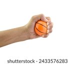 male hand squeezing orange stress ball basketball shape isolated on white background, foam squeezing ball for hand and finger exercise or relieve stress