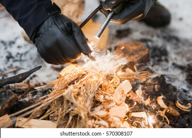 Male Hand Starts Fire With Magnesium Fire Steel, Fire Striker