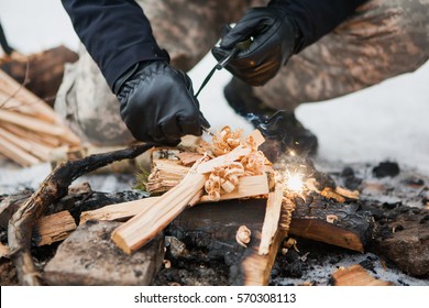 Male Hand Starts Fire With Magnesium Fire Steel, Fire Striker