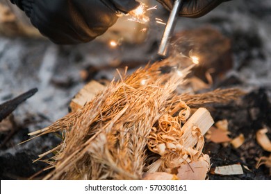 Male Hand Starts Fire With Magnesium Fire Steel, Fire Striker