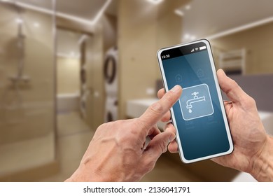 Male Hand Touch Digital Smartphone Screen With Water Use Icon On Blurred Bathroom Background