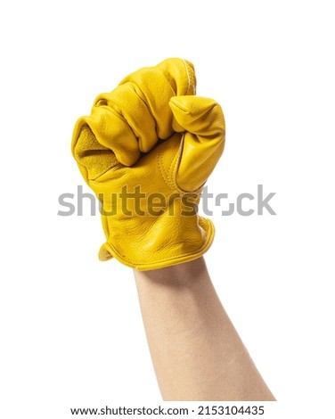 Male hand wearing yellow leather glove on white background. Sign with hand.