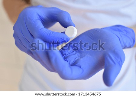 male hands in blue gloves. Measures against the virus