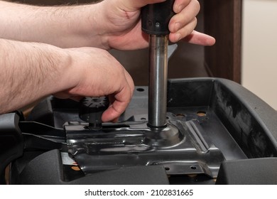 Male hands fixing furniture at home, close-up. Do it yourself concept. Repair and assembly of furniture at home. - Powered by Shutterstock