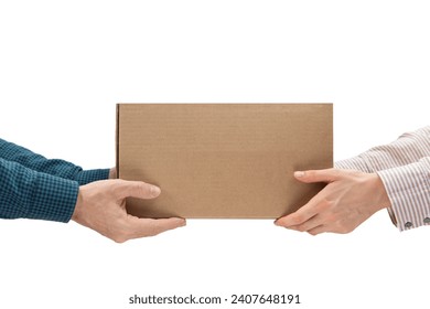 Male hands giving a package, female hands receiving a package. Purchase delivery concept - Powered by Shutterstock