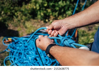 Male Hands Holding Rope Tying Knot Stock Photo 2152638775 