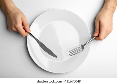 Male Hands Holding Silver Cutlery Over Stock Photo 411678049 | Shutterstock