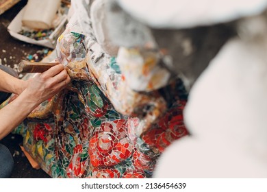 Male Hands Making Mosaics In Hat Making Smalt Glass Mosaic Panel. Man Mosaicist At Work