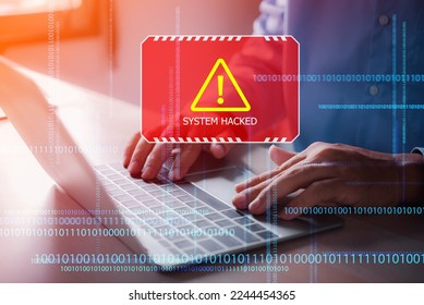 male hands on computer laptop got a red warning system hacked on the virtual digital screen
