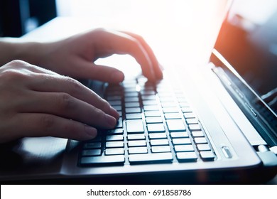 Male Hands On A Laptop Keyboard. Computer Laptop Keyboard Typing Hand Technology Internet Work Concept