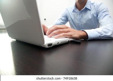 Male Hands Typing On A Keyboard