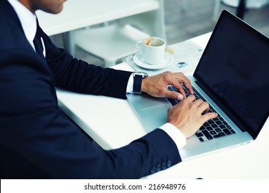 Male Hands Typing On Laptop Computer Keyboard, Businessman Seated In Cafe Working With Computer, Businesspeople Using Modern Devises, Crop Of Rich Businessman In Suit Working With Laptop Computer