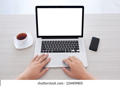 Male Hands Typing On A Laptop Keyboard In The Office