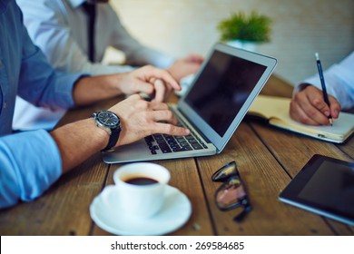 Male Hands Typing On Laptop Keypad In Working Environment