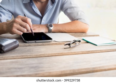 male hands using digital computer tablet with isolated screen