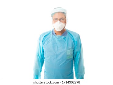 Male Healthcare Worker In Protective PPE Gown, N95 Respirator Mask And Face Shield