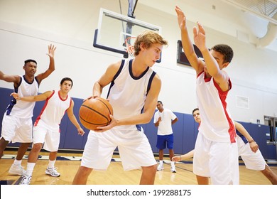 Male High School Basketball Team Playing Game