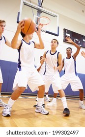 Male High School Basketball Team Playing Game